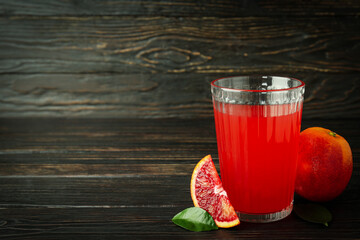 Concept of fresh drink with red orange juice