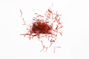 Fototapeta premium Saffron on white background, kesar, crocus, saffron background, pile of saffron