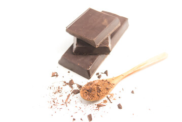 black Chocolate on spoon close up