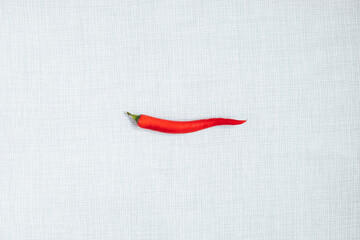 Green and red chili peppers on different background. Colorful and strong.