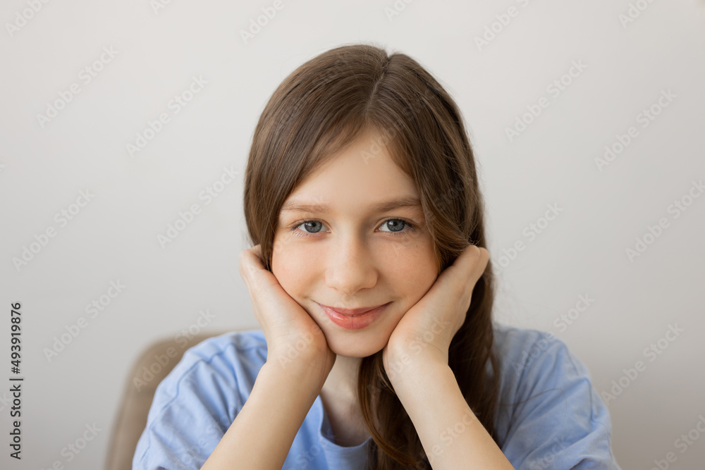 Wall mural kind cute face of caucasian teen girl 