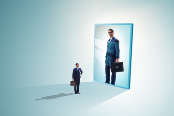 Young businessman in alter ego concept - obrazy, fototapety, plakaty