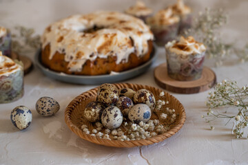 Easter lemon cake with icing and easter decoration. Easter gugelhupf cake with coconut decorations, quail eggs