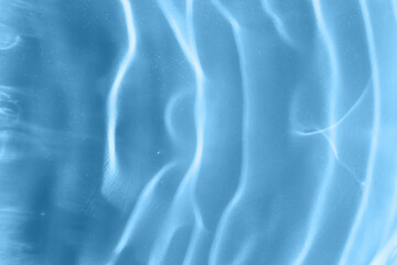Textured background of waves on the water