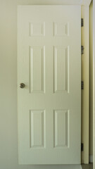 white closed door with frame isolated on background.