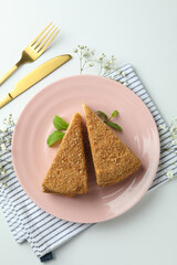 Concept of tasty dessert with honey cake, top view