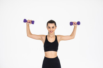 Fototapeta na wymiar Young woman with dumbbell fit slim abs body isolated on a white background. Healthy lifestyle.