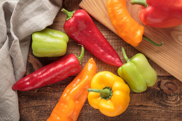 Red peppers on wooden background