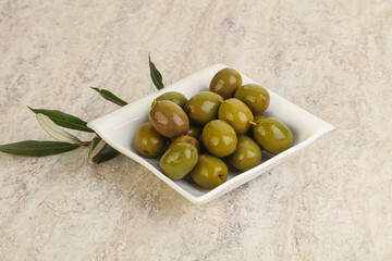Tasty marinated olives in the bowl