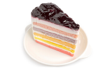 A Piece of Rainbow Cake isolated on white background. Clipping path