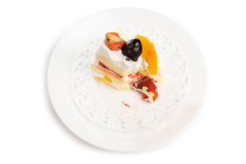 bitten cake on the white plate isolated on white background. Clipping path