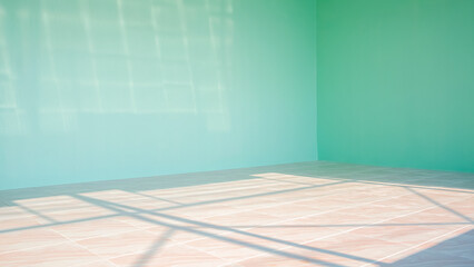 Sunlight and shadow on marble tile floor surface with green cement wall in empty room inside of house construction site, perspective side view
