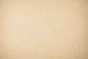 Brown recycled craft paper texture as background. Cream paper texture, Old vintage page or grunge vignette.