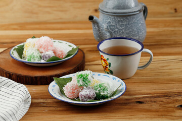 Sentiling, Steamed Grated Cassava with Food Coloring, Coated with Grated Coconut