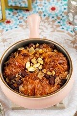 Om Ali, Umm Ali or Oum Ali is a traditional and popular Egyptian dessert. Egyptian Bread Pudding. Arabic cuisine