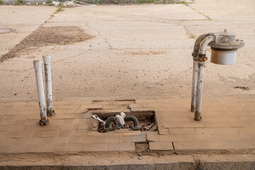 remains of a fuel pump at an abandoned gas station. Crisis fuel concept