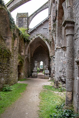 Fototapeta na wymiar Paimpol. Les arcades du cloître de l'abbaye de Beauport. Côtes-d'Armor. Bretagne