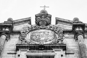 Facade emblazoned in granite, in a palace in the old town of Pontevedra (Spain)