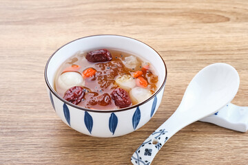 Peach Gum, Chinese traditional drink that contains peach gum, bird nest, red dates, snow fungus, goji berry, and rock sugar. 

