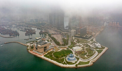 Hong Kong 18 March 2022,Aerial view of West Kowloon Cultural District on a foggy day .