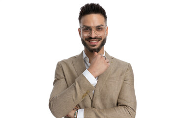 businessman smiling at the camera, crossing his arms