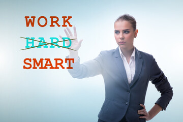 Businesswoman in working smart not hard concept