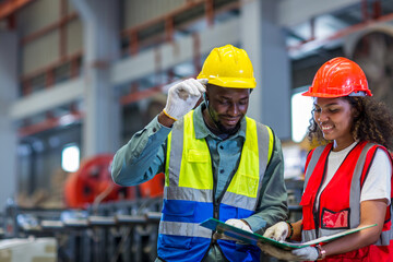 Foreman or worker work at factory site check up machine or products in site. Engineer or Technician checking Material or Machine on Plant.  Industrial and Factory.	