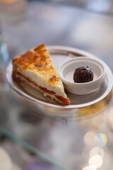 Pie served with a ball of chocolate 