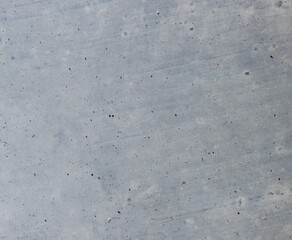 close up of washed out light blue matte surface
