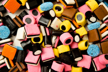 Sweet gummies, licorice gums, candies for kids and grown-ups .