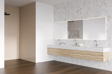 Corner view on bright bathroom interior with shower, large mirror