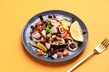 Plate of Mexican vegetable salad with black beans and radish on color background