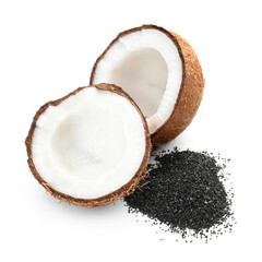 Ripe coconut halves with pile of activated carbon on white background - obrazy, fototapety, plakaty