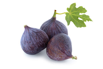 Three figs with leaf isolated on white background