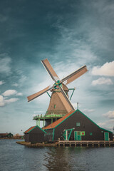 Colorful Dutch windmills on the river. tourism place