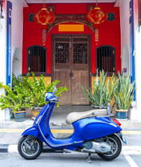 Blue Motor bike at Phuket town thailand. Sino Portuguese building. 