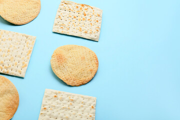 Different Jewish flatbread matza for Passover on color background