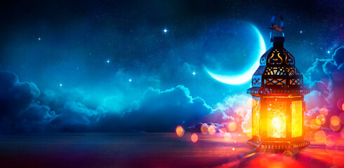 Ramadan Kareem - Moon And Arabian Lantern With Blue Sky At Night With Abstract Defocused Lights -...