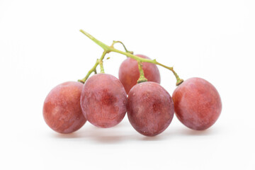 Bunch of red grapes isolated on background.