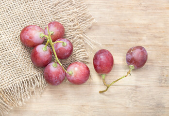 Red grapes placed on background, View from directly above.