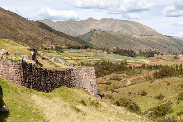 Beautiful view of the Puka Pukara Inca Archaeological Complex with its stone walls in Cusco, Peru