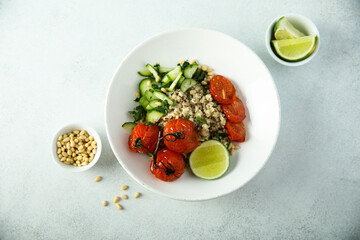 Healthy quinoa bowl with tomato confit