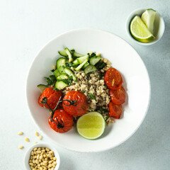 Healthy quinoa bowl with tomato confit