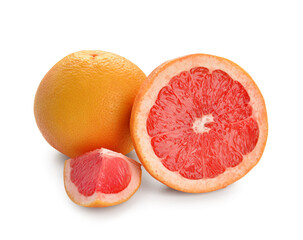 Tasty cut grapefruits on white background