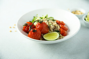 Healthy quinoa bowl with tomato confit
