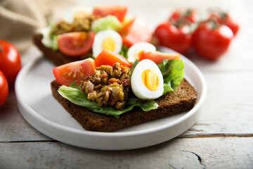 Egg toast with tomato and olive paste