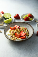 Granola with yogurt and fresh strawberry