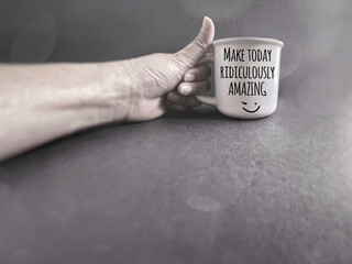Make today ridiculously amazing text in bokeh background. Inspirational quote. Stock photo.