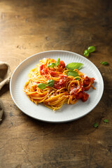 Spaghetti with tomato sauce and basil