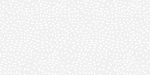 Neutral seamless pattern with white strokes on light grey background. Low-contrast non-directional repeat vector design with circle shapes. 
